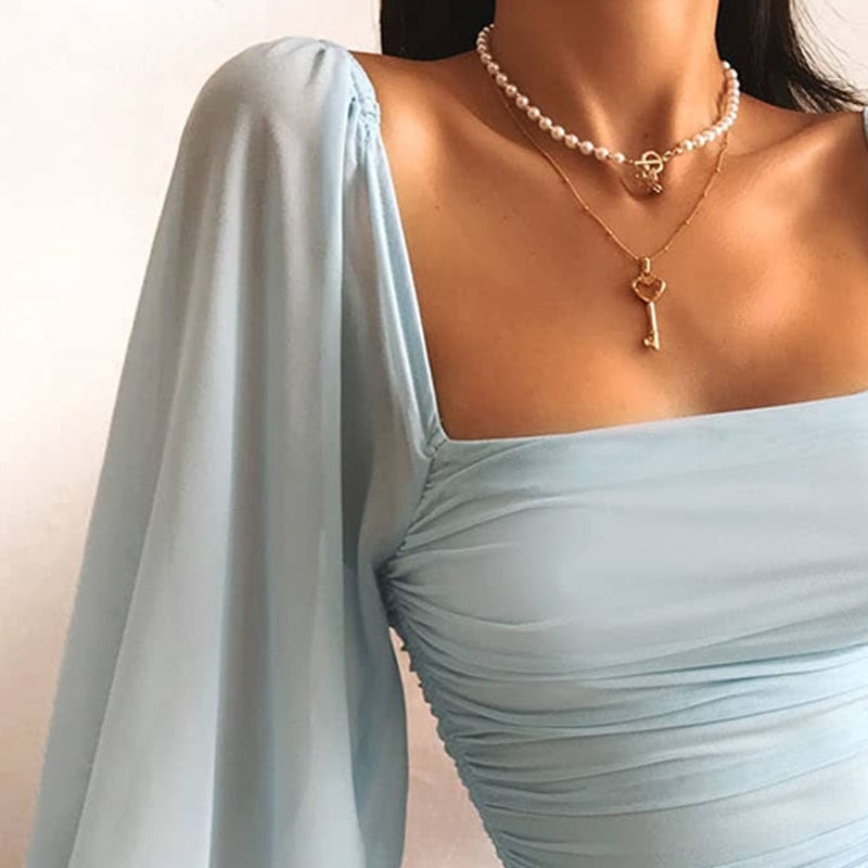 Marjan | Dames Mini-Jurk – Elegante Pofmouwen, Aansluitend Silhouet, Verstelbare Pasvorm