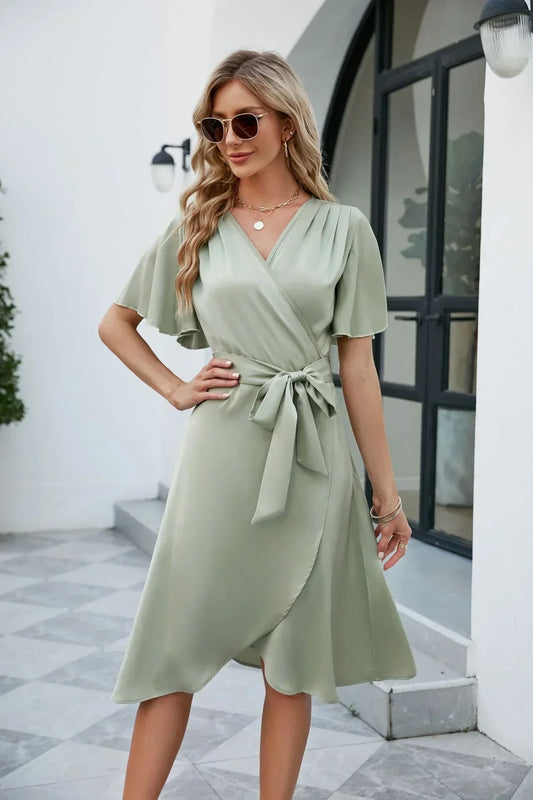 Evi | Wikkeljurk voor Dames – Elegante V-Hals en Strikdetail voor een Flatterende Pasvorm