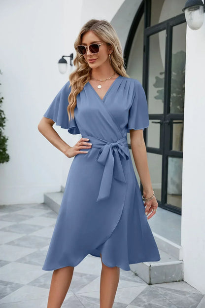 Evi | Wikkeljurk voor Dames – Elegante V-Hals en Strikdetail voor een Flatterende Pasvorm
