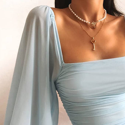 Marjan | Dames Mini-Jurk – Elegante Pofmouwen, Aansluitend Silhouet, Verstelbare Pasvorm