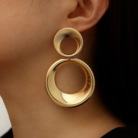 Circles Oorbellen | Dames oorbellen met 3D-cirkeldesign in goudkleurig metaal