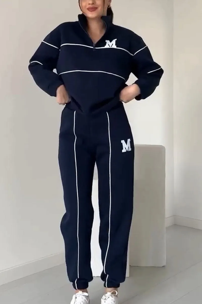 Tracksuit | Dames trainingspak met contrasterende lijnen en relaxed fit